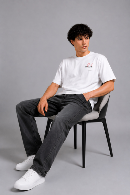 White graphic print t-shirt men - seated pose