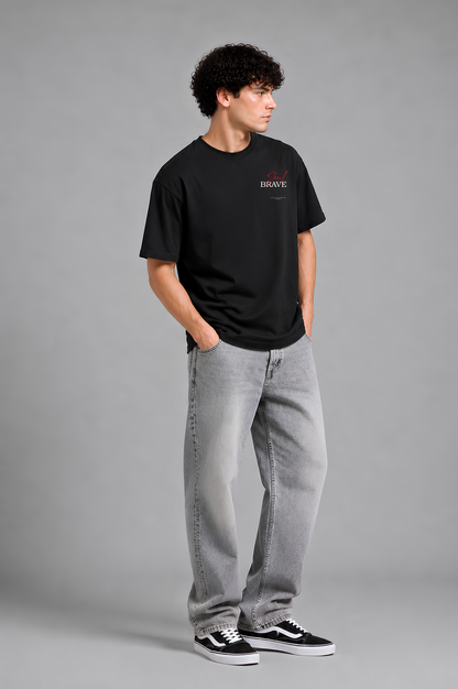 Black graphic print t-shirt men - side pose walking